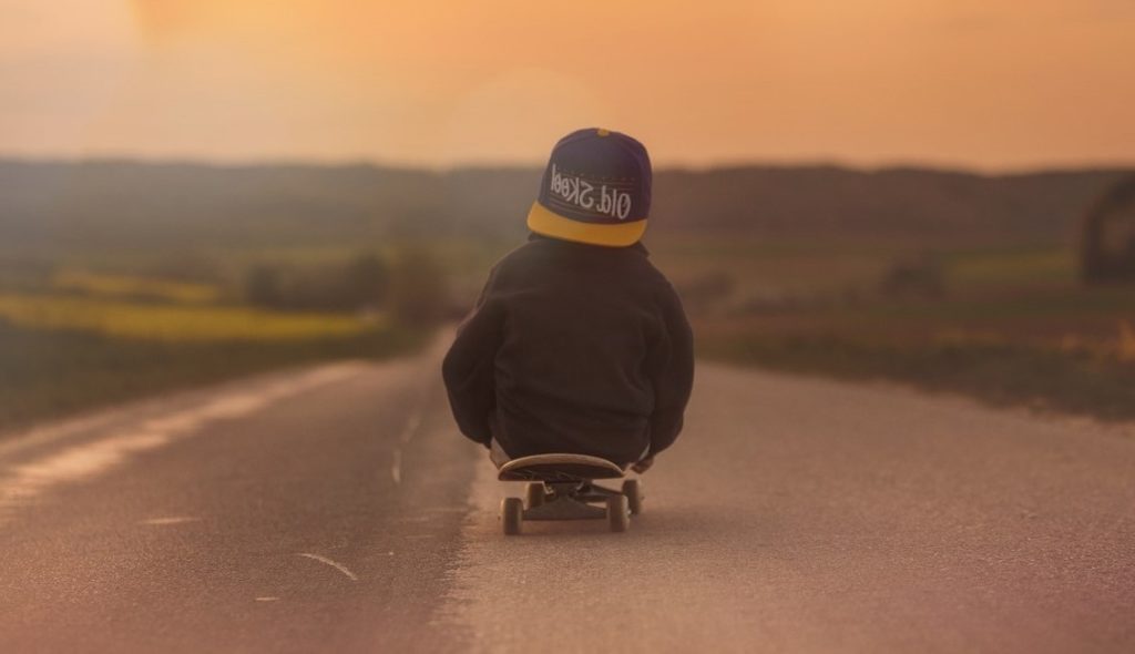 kid riding a skateboard